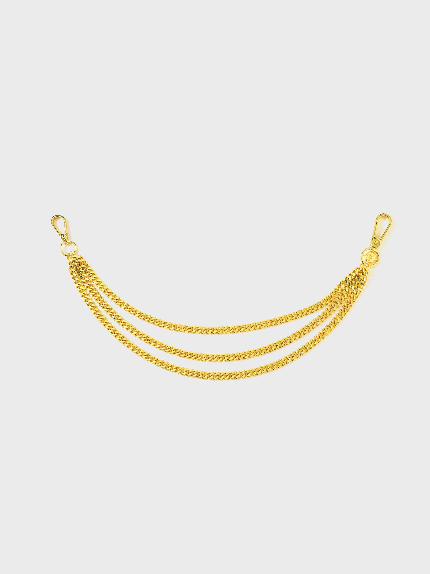 A gold-colored wallet chain with multiple links and a clasp on each end.