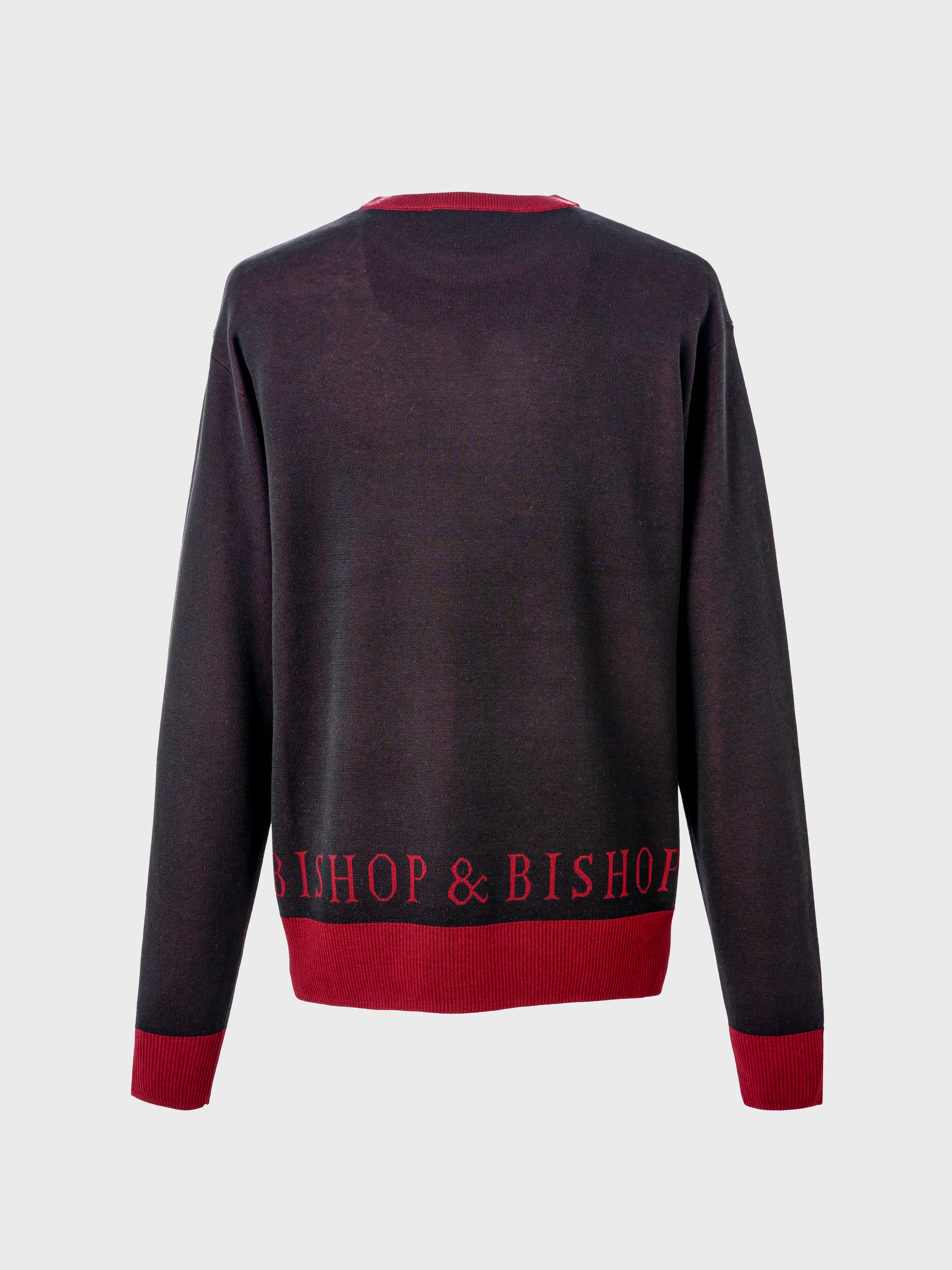 Rear view of a black and red knit sweater