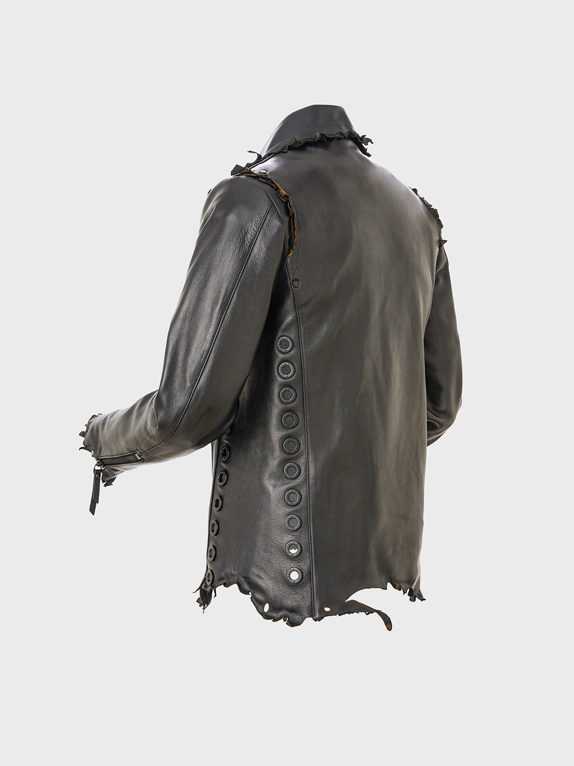 Rear view of a black leather jacket with a distressed-style design and circular metal studs.
