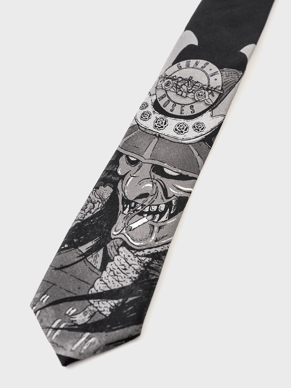 Black and white tie with samurai design on a white background