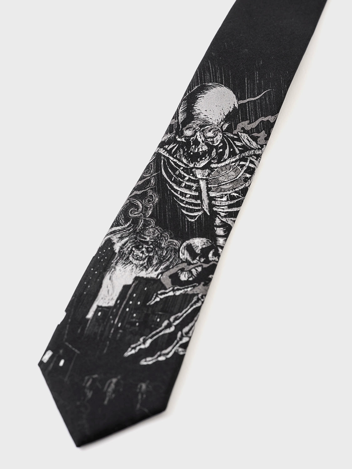Black tie with a detailed skeleton design on a white background