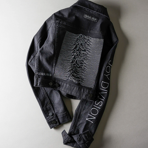 Black jacket with graphic design and text on a gray background