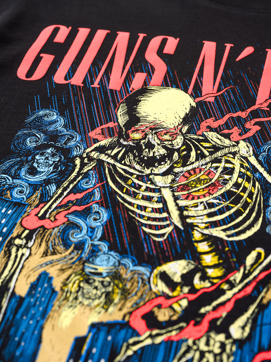 Skeleton with guitar on a 'Guns N' Roses' themed shirt