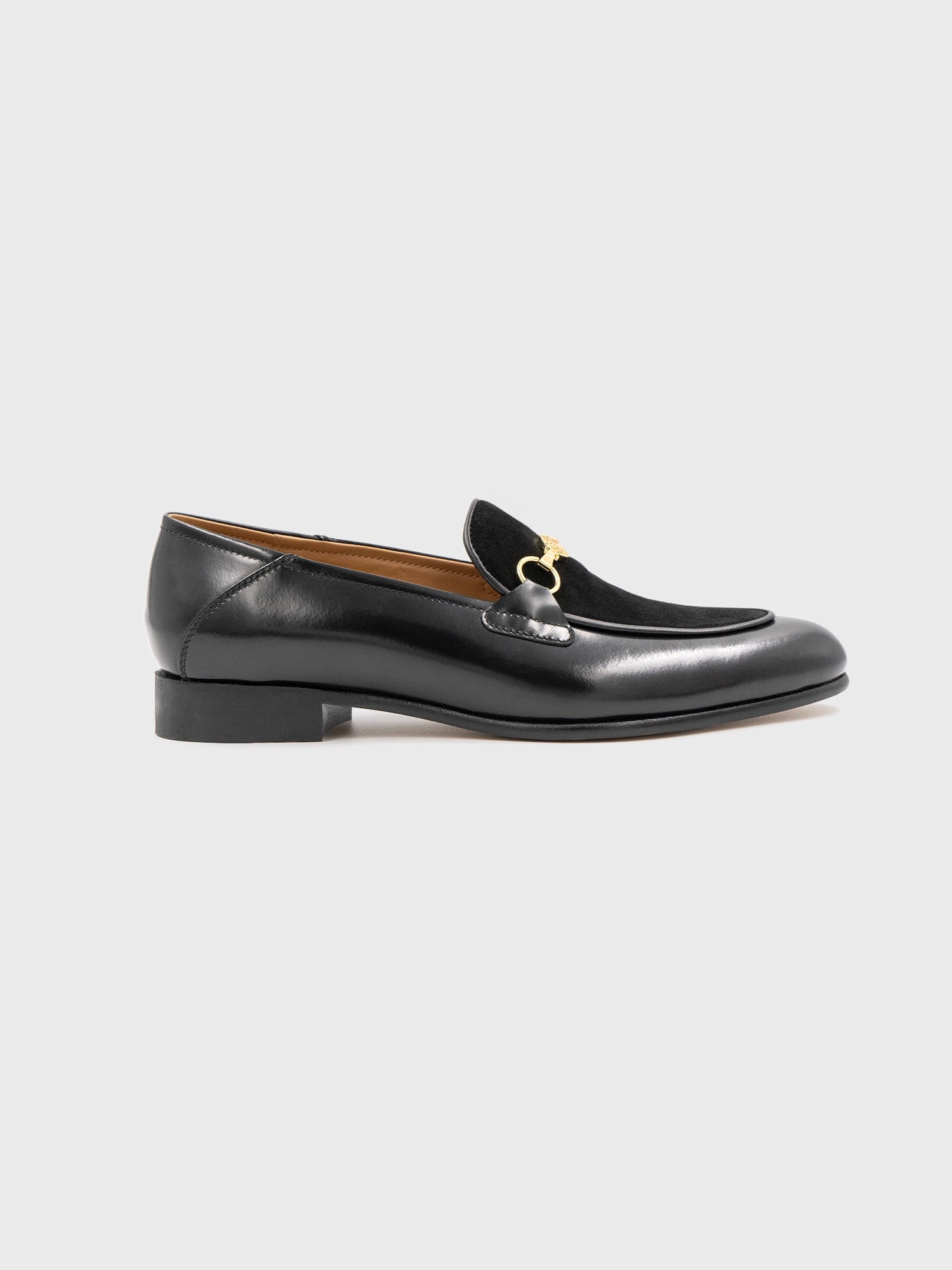 Black shoe with gold detailing