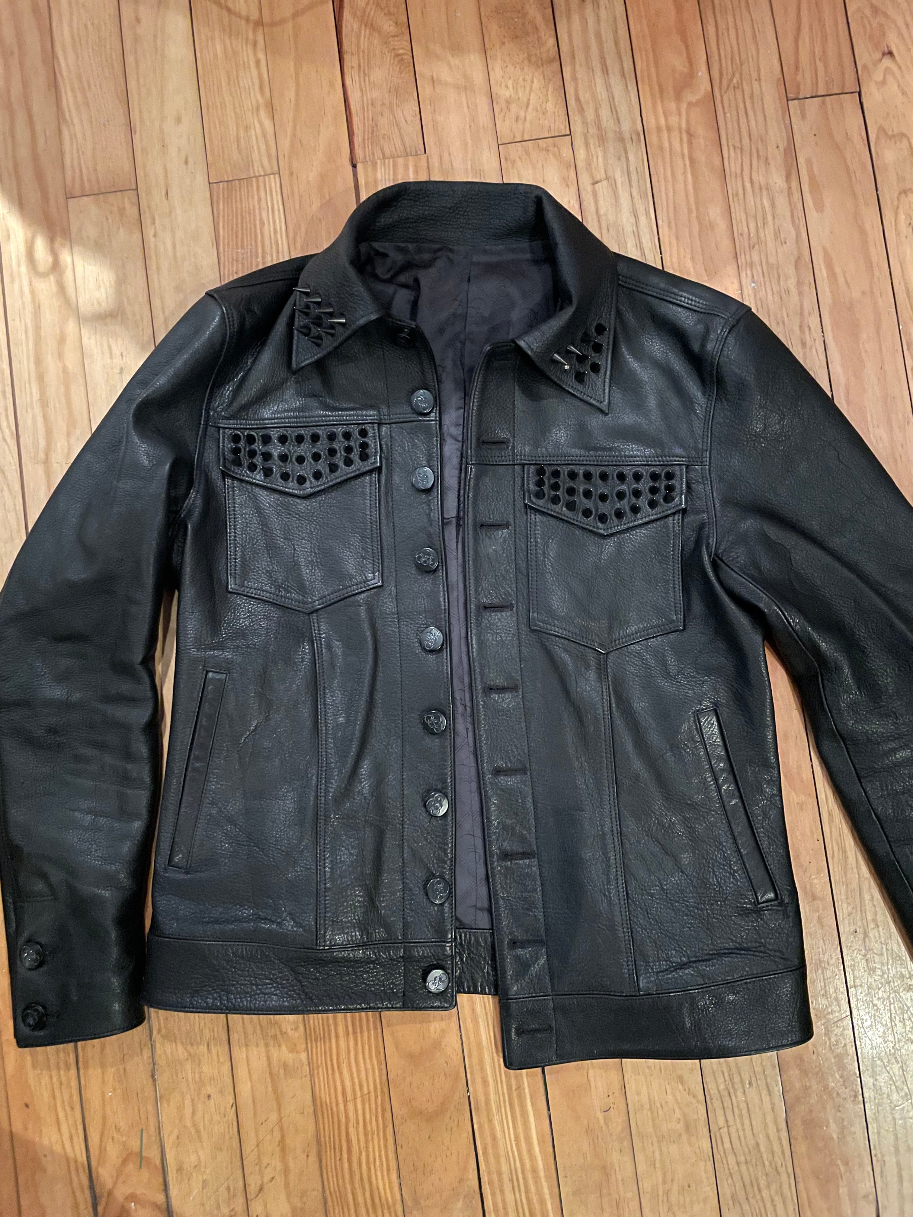 Front view of the first sample Bishop Leather Trucker Jacket – Blackout Edition, made in Japan, featuring black leather and spike detailing.