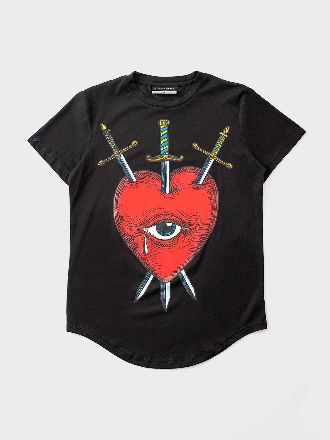 Black crew neck t-shirt with a graphic print of a red heart, an eye, and crossed swords.