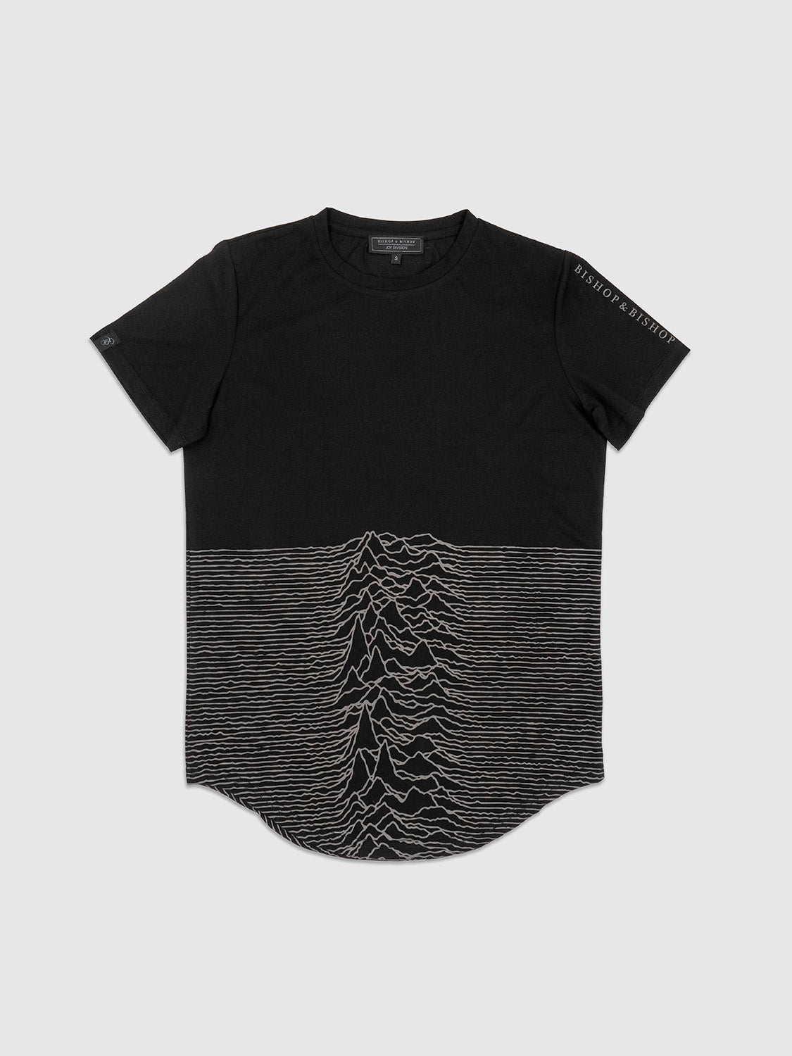 Front view of the black drop-cut T-shirt with full-width Unknown Pleasures artwork printed across the lower half.