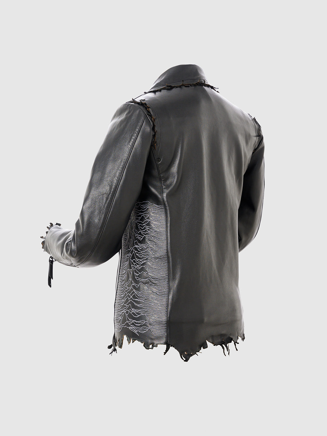 Angled side view of the jacket showing the rugged texture and drape of the sheep leather.