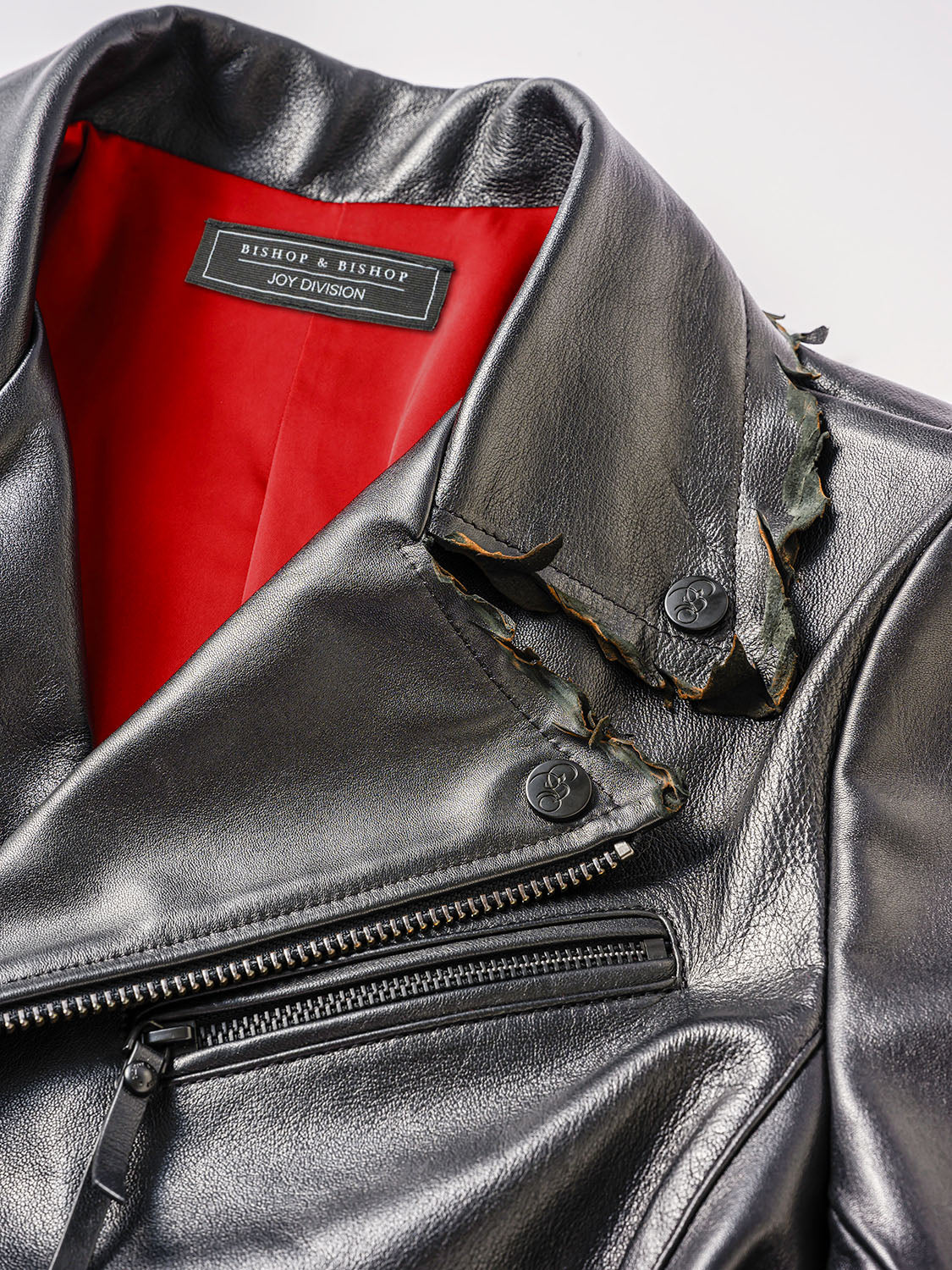 Close-up of the collar and red silk lining with the Joy Division label stitched inside.