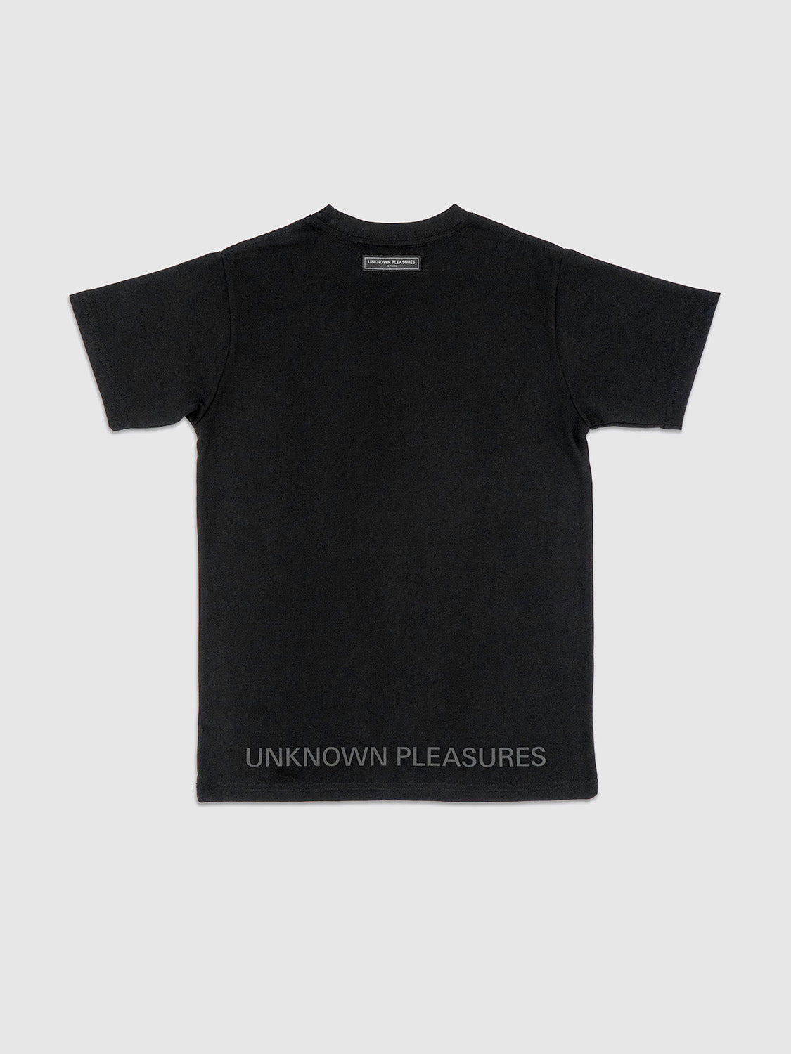 Rear view of the T-shirt showing a clean silhouette and classic drop-cut hem.