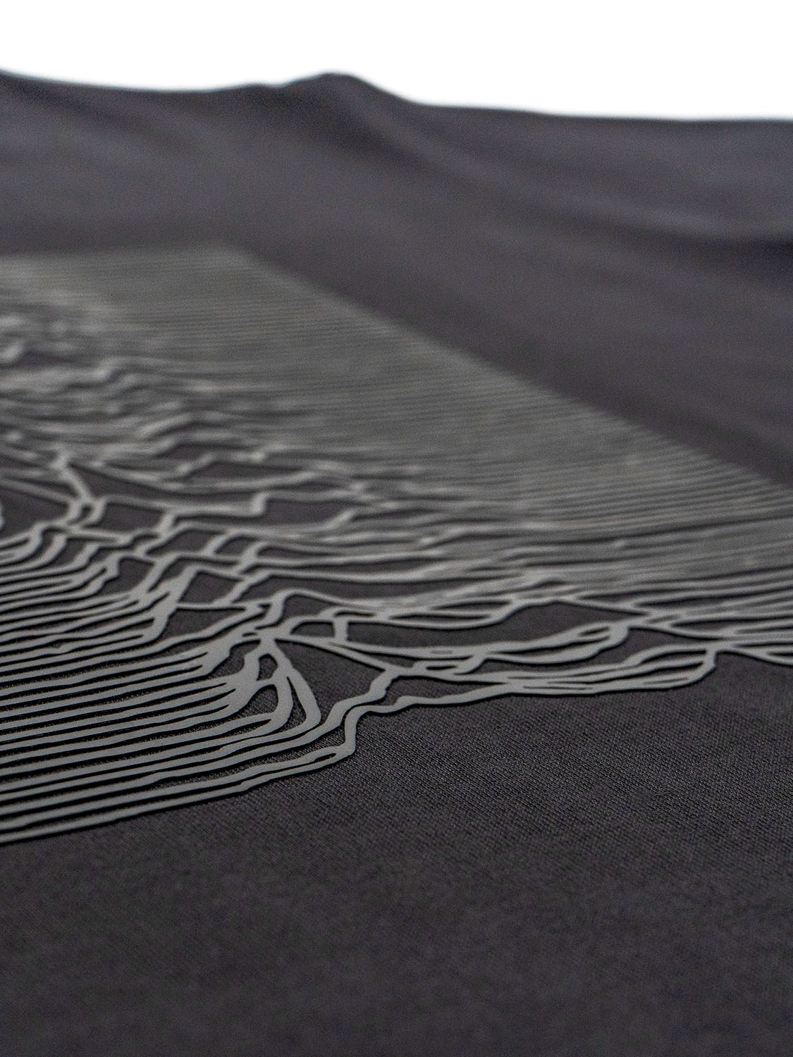 Macro shot of the inner collar showing reinforced stitching and woven branding tag.
