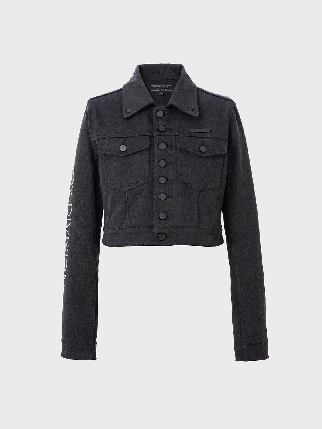 Front view of the women's washed black denim trucker jacket with button closure and classic cut.