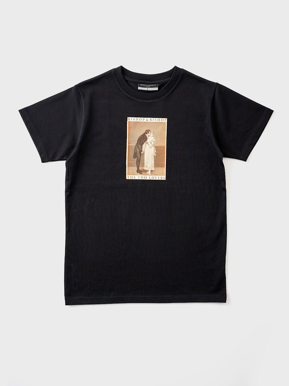 Black T-shirt featuring a vintage-style graphic of a man and a woman, with “Bishop & Bishop” printed above and “The Two Lovers” below, displayed on a white background.