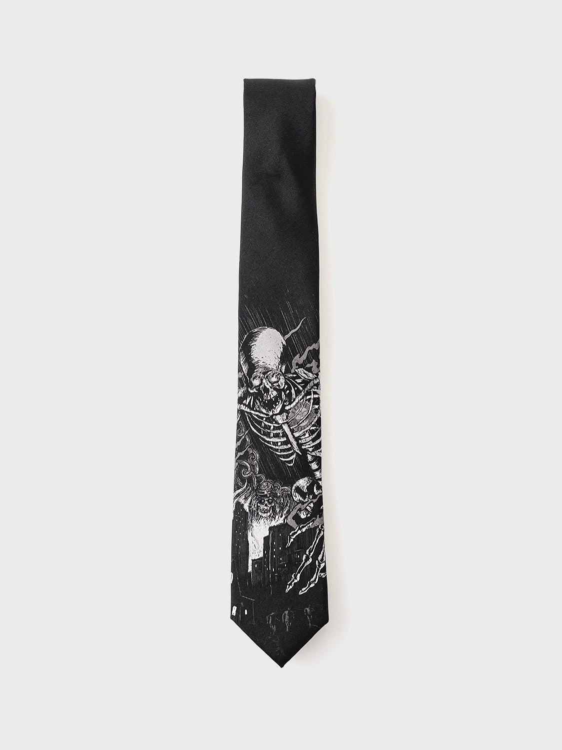 Black tie with a white skeleton design on a white background
