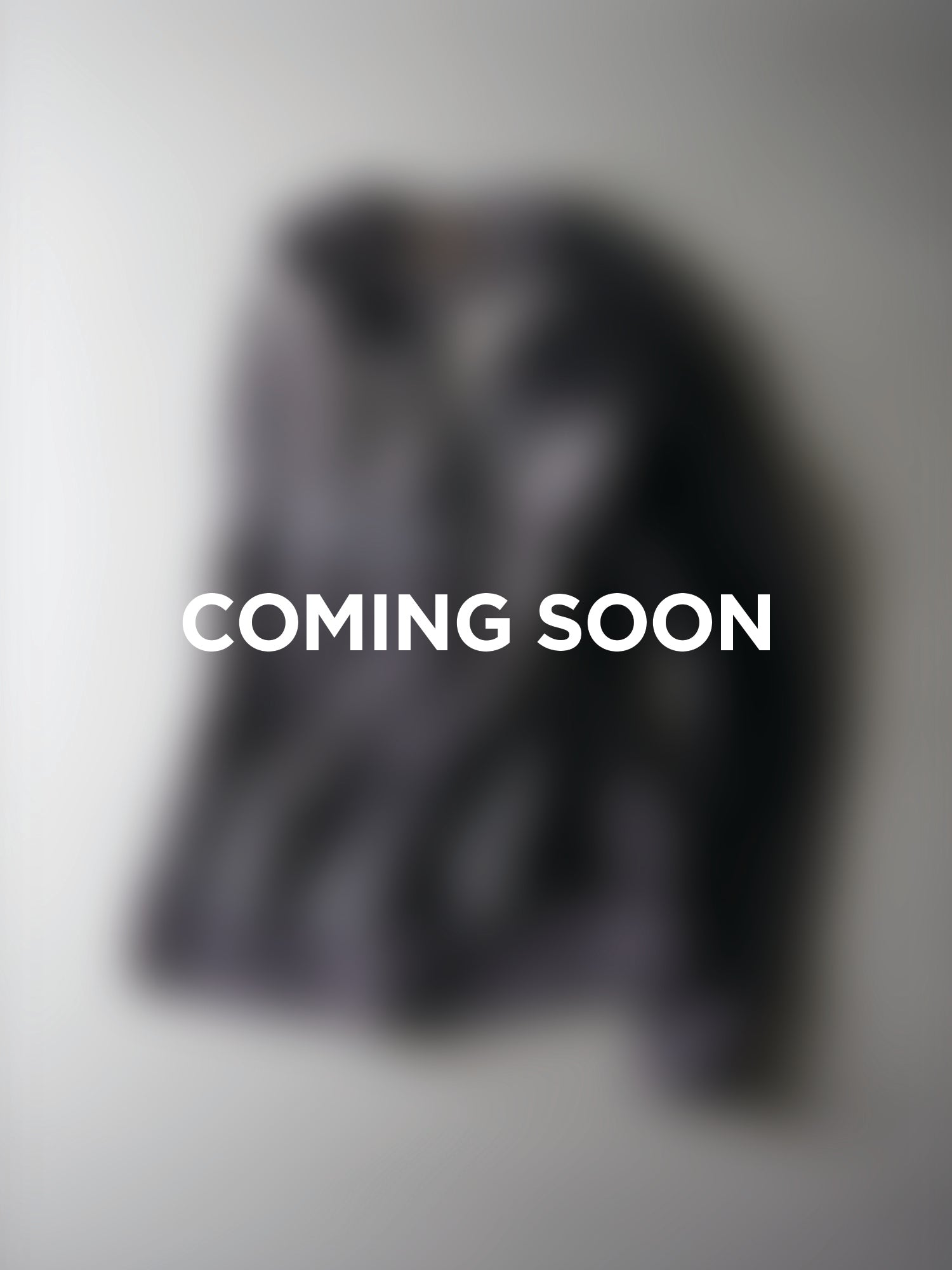 Blurred product image with 'COMING SOON' text on a gray background